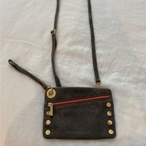 Hammitt Pewter Crossbody Clutch Wristlet Purse with Red and Gold Details.